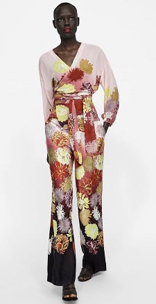 A woman wearing Floral Print Wrap Blouse. close up details
