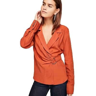 A woman wearing a Cypress Ave Top