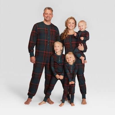 A family wearing Plaid Holiday Family Pajamas