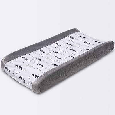 Wipeable changing pad cover with animal prints and plush sides in solid gray