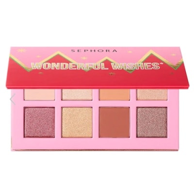 An eyeshadow palette in a pink package
