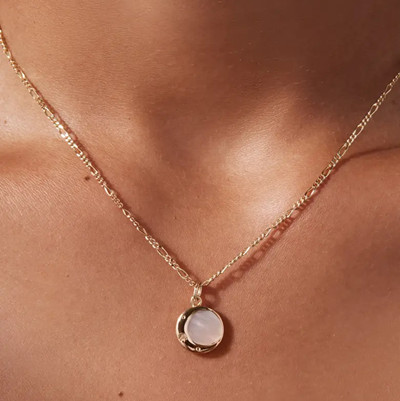 moonstone pendant shaped like a moon