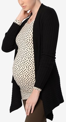 A woman wearing a Autumn Cashmere Maternity Open Front Cardigan