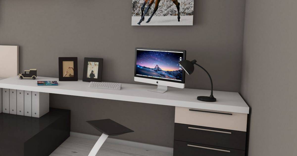 An Apple iMac Retina on top of a desk