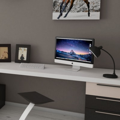 An Apple iMac Retina on top of a desk