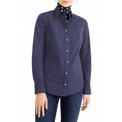 A woman wearing a J Crew Slim Stretch Perfect Shirt