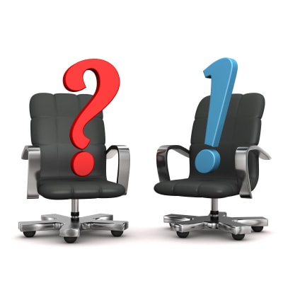 A pair of question and answer chairs