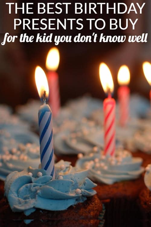 A birthday cupcake with lit candles