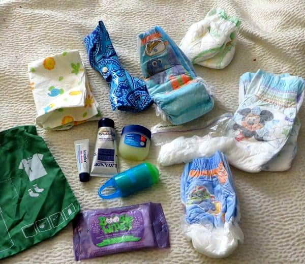 A set of Baby Essentials on top of a bed