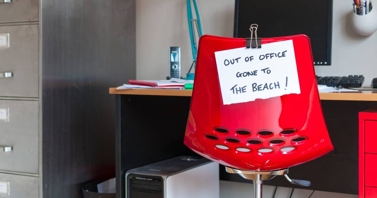 An "Out of Office Gone to the Beach"sign