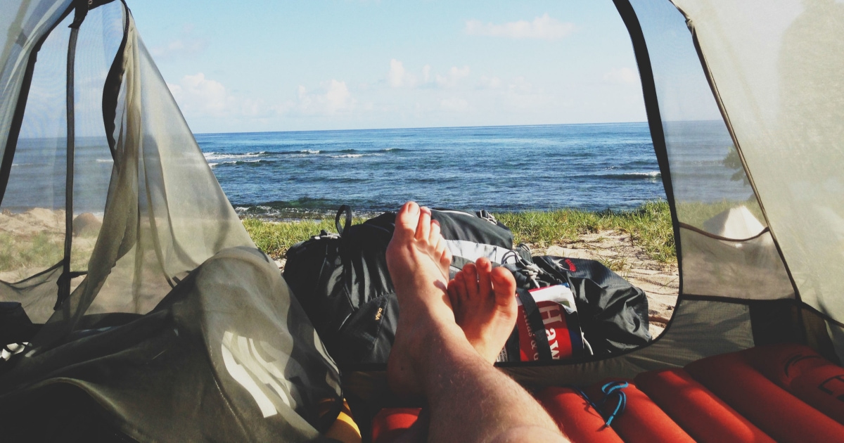 view of lake from inside tent