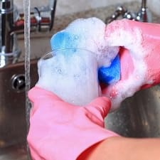 A woman washing dishes