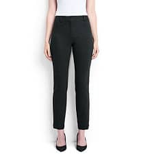 A woman wearing a pair of Mid Rise Ponte Ankle Pants.