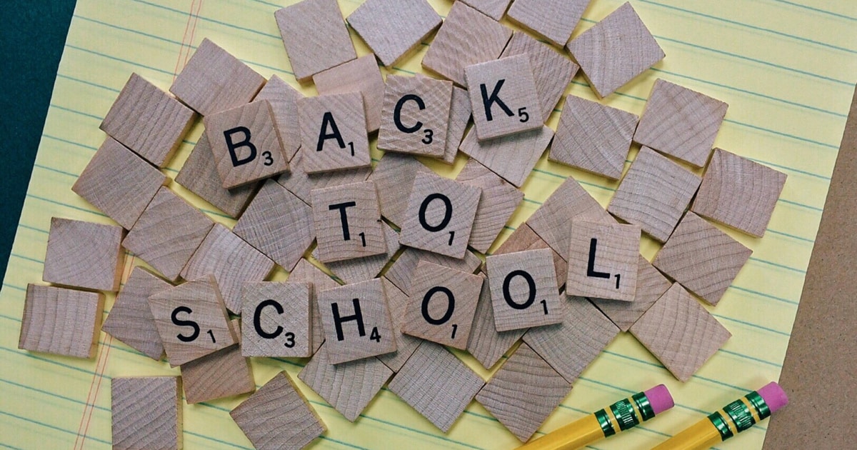 Scrabble block letters reading out "Back to School"