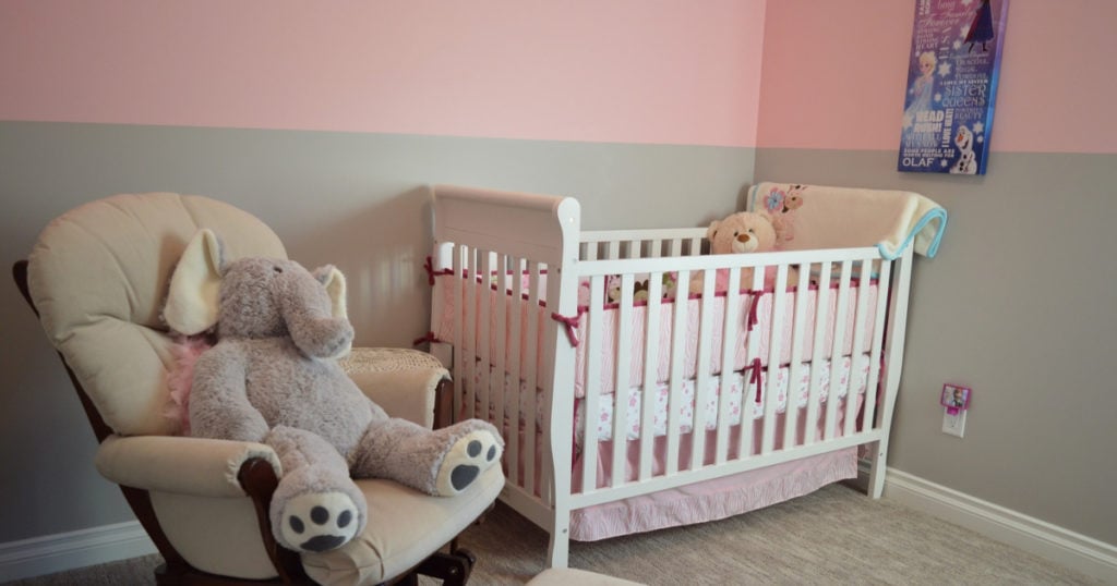 A child\'s bedroom with stuffed animals