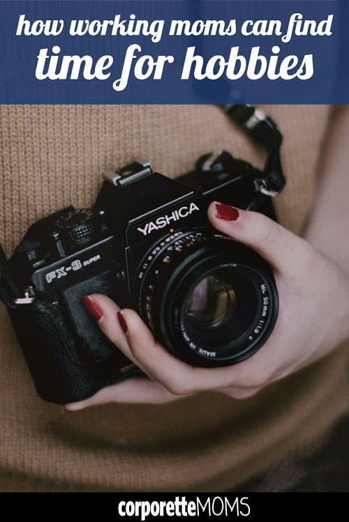 A woman holding a digital camera