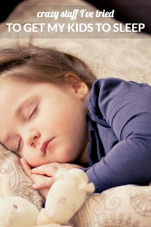 A close up of a child sleeping