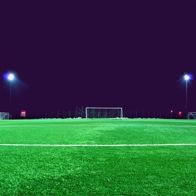 A close up of a lush green soccer field