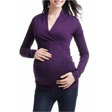 A woman wearing an  Olivia V-Neck Maternity