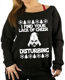 A woman wearing a Star Wars Ugly Christmas Sweater.
