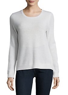 A woman wearing a Lord & Taylor Cashmere top