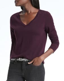 A woman wearing a  Machine-Washable Merino Vee