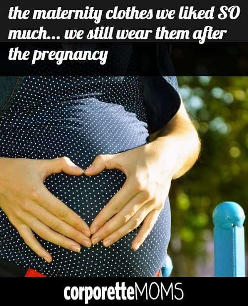 A pregnant woman posing with a heart sign on her hands.