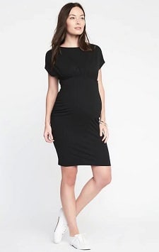 A woman wearing a Dolman-Sleeve Bodycon Dress