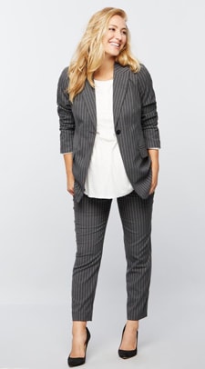 A woman wearing a pair of Pinstripe Maternity Suit