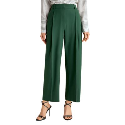 A professional woman wears high-waisted forest green wide-leg trousers with front pleats