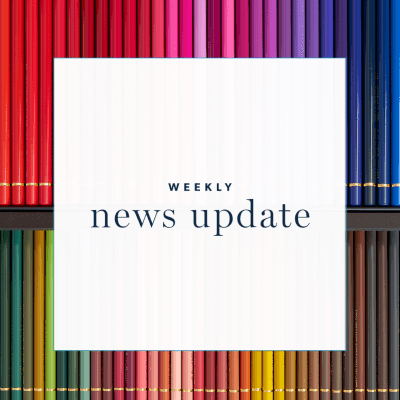 A white square with text "weekly news update" surrounded by a square border of a book design