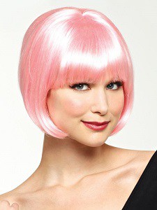 A woman wearing a pink diva wig.