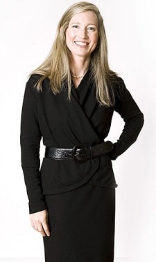A woman wearing a signature jacket