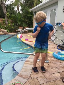 A child playing by the pool