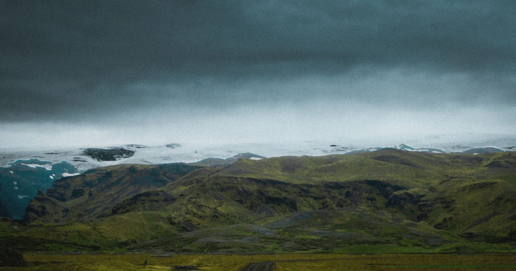 A large mountain in the background