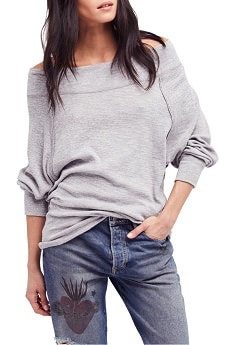A woman wearing the We The Free Palisades thermal top off the shoulder slouch casual heather gray
