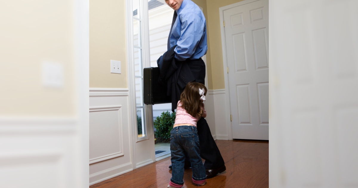 young daughter clinging to her father's leg as he tries to leave for work