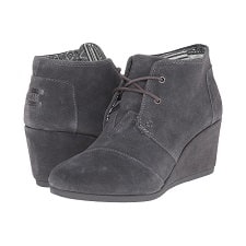 A pair of Toms Shoes Toms Suede Wedge Booties