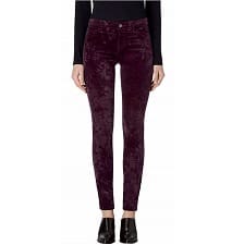 A woman wearing a pair of J BRAND Womens Pants Hipster Skinny Crystal Aubergine