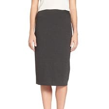 A woman wearing a Kasper Women's Pin-Dot Pencil Skirt