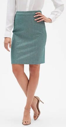 A woman wearing a Herringbone Pencil Skirt